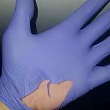 Cheap B grade industrial gloves tear easily